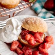 French breakfast puff with strawberries and whipped cream.