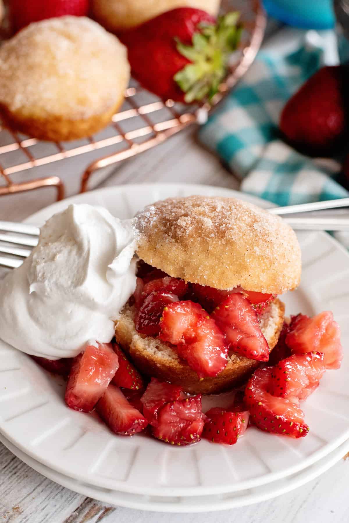 French breakfast puff with strawberries and whipped cream.