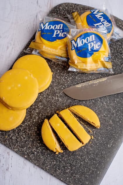Unwrap and cut moon pies.