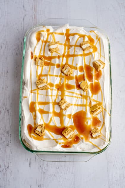 Add more caramel and bite-sized Moon Pie bits to the top of the cake.