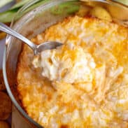 Spoonful of cheesy baked onion dip.