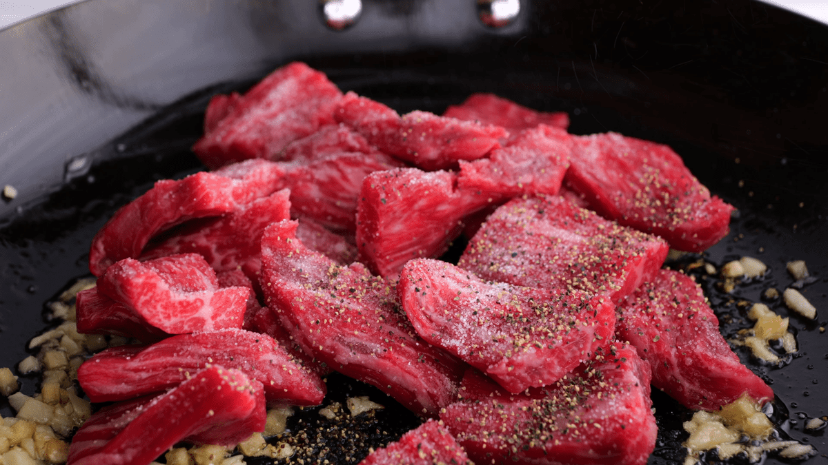 Add steak to skillet.