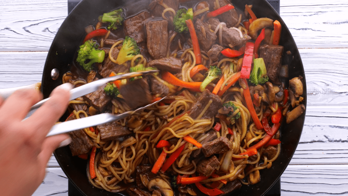 Toss to combine beef lo mein.