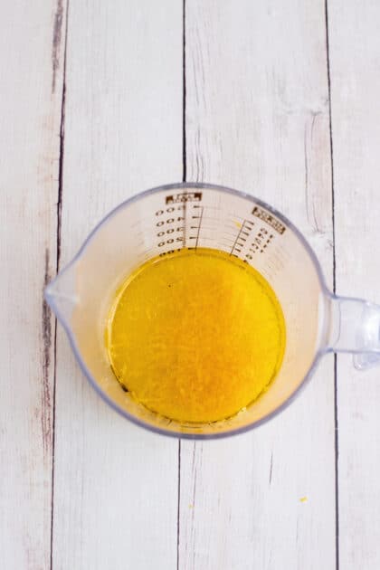 Add lemon juice and zest to oil.