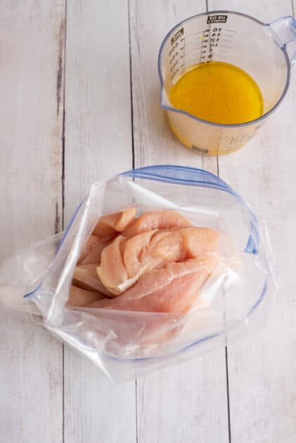 Place chicken in zipper seal bag.