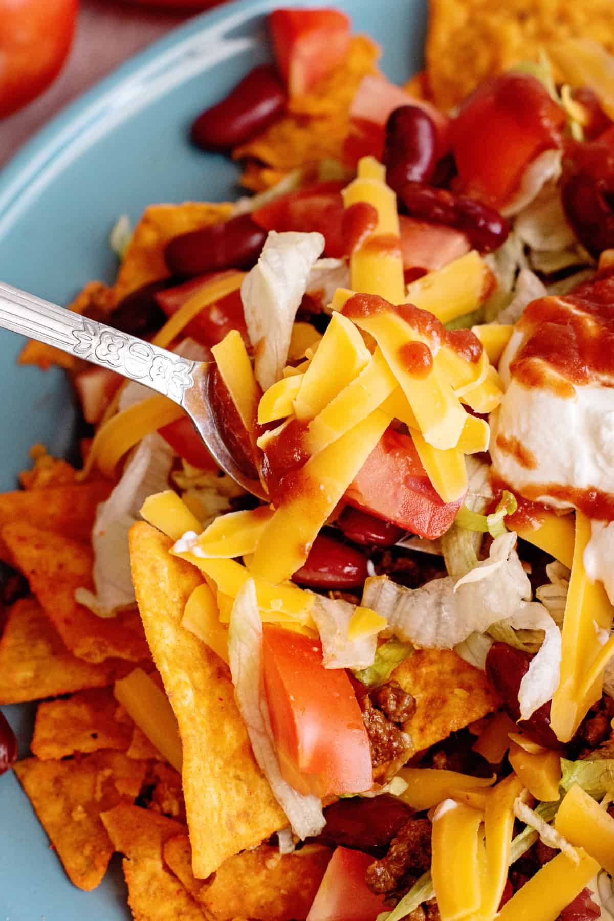Forkful of fiesta taco salad.