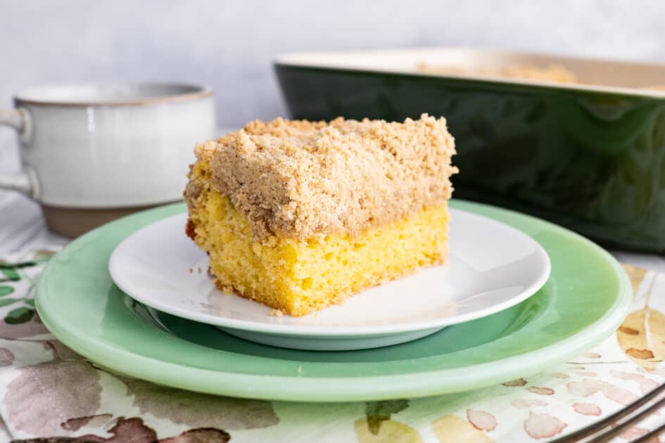 Slice of crumb cake on plate.