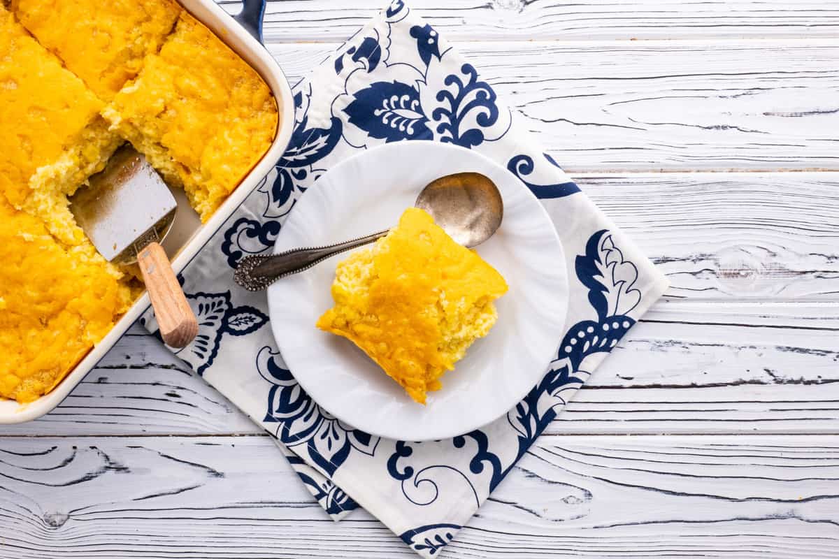 Slice of Jiffy corn casserole on plate.