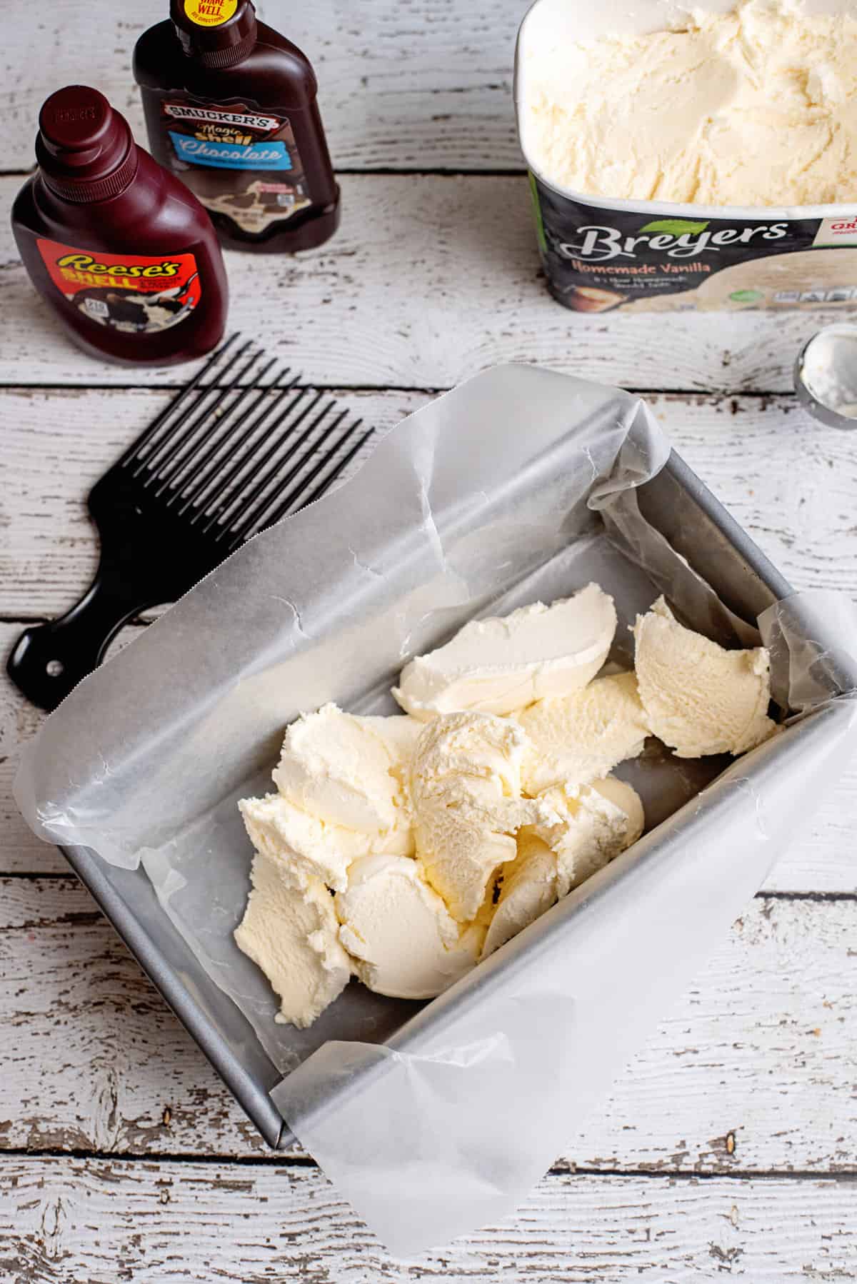 spread 1/3 of ice cream into bottom of loaf pan