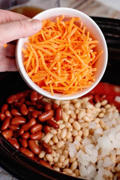 Add shredded carrot to crockpot.