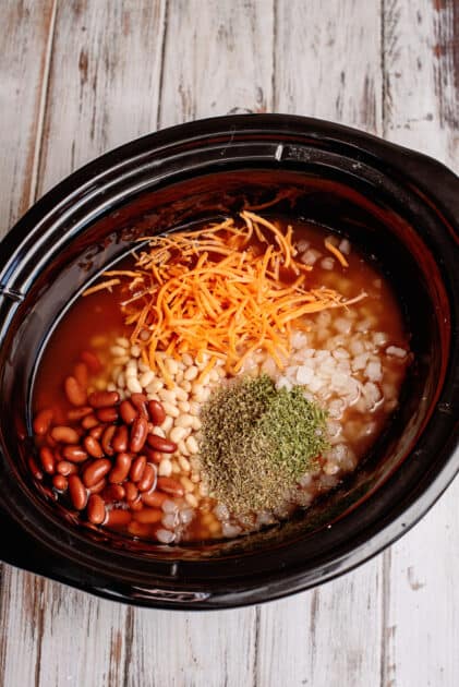 All pasta fagioli ingredients in slow cooker.