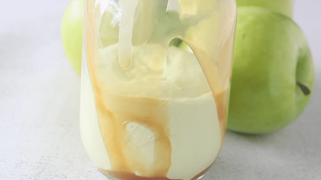 Fill glass with caramel apple milkshake.