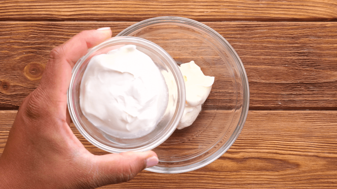 Add sour cream to mixing bowl.