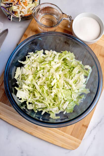 Add chopped cabbage to mixing bowl.