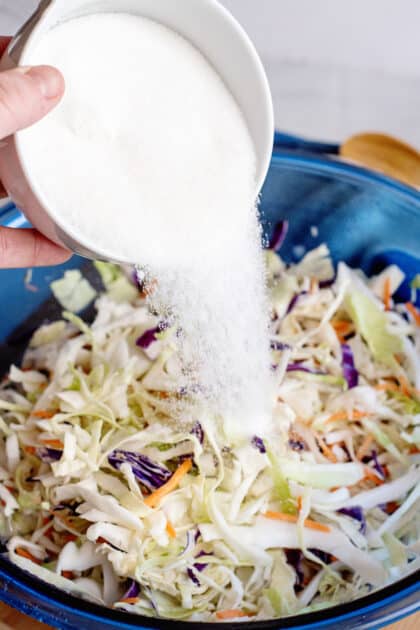 Add sugar to mixing bowl.