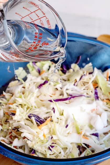 Add vinegar to mixing bowl.