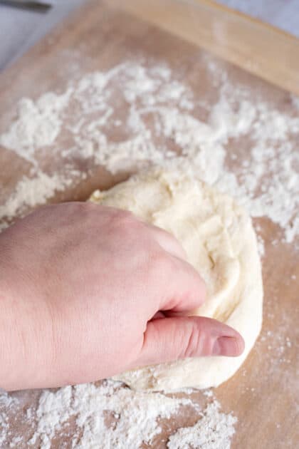 Knead dough a couple of times.