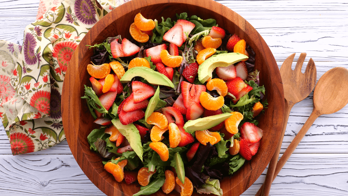 Add avocado to salad bowl.