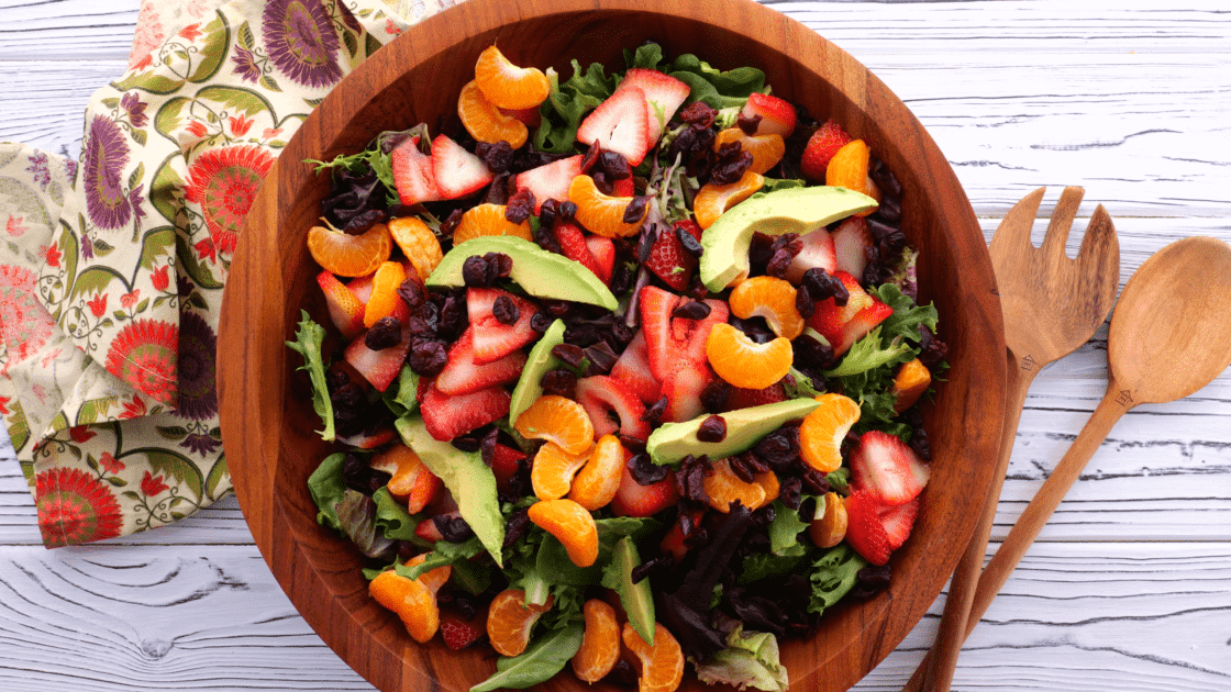 Add dried cranberries to salad bowl.