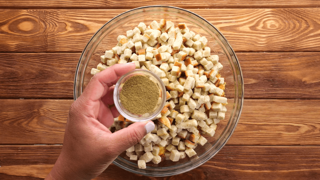 Add poultry seasoning to mixing bowl.