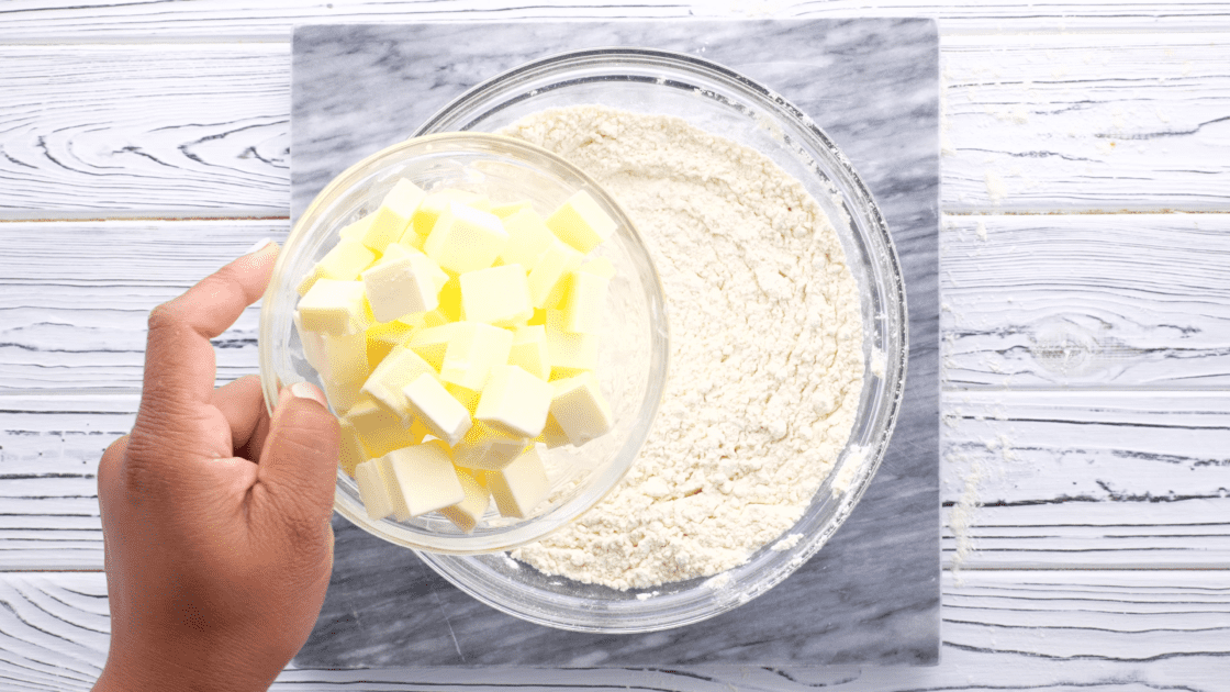 Add butter to mixing bowl.