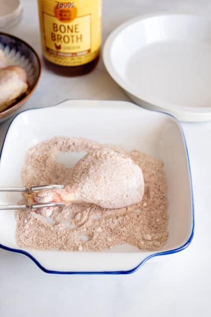 Coat chicken in flour mixture.