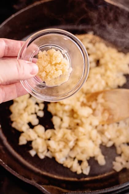Add garlic to skillet.