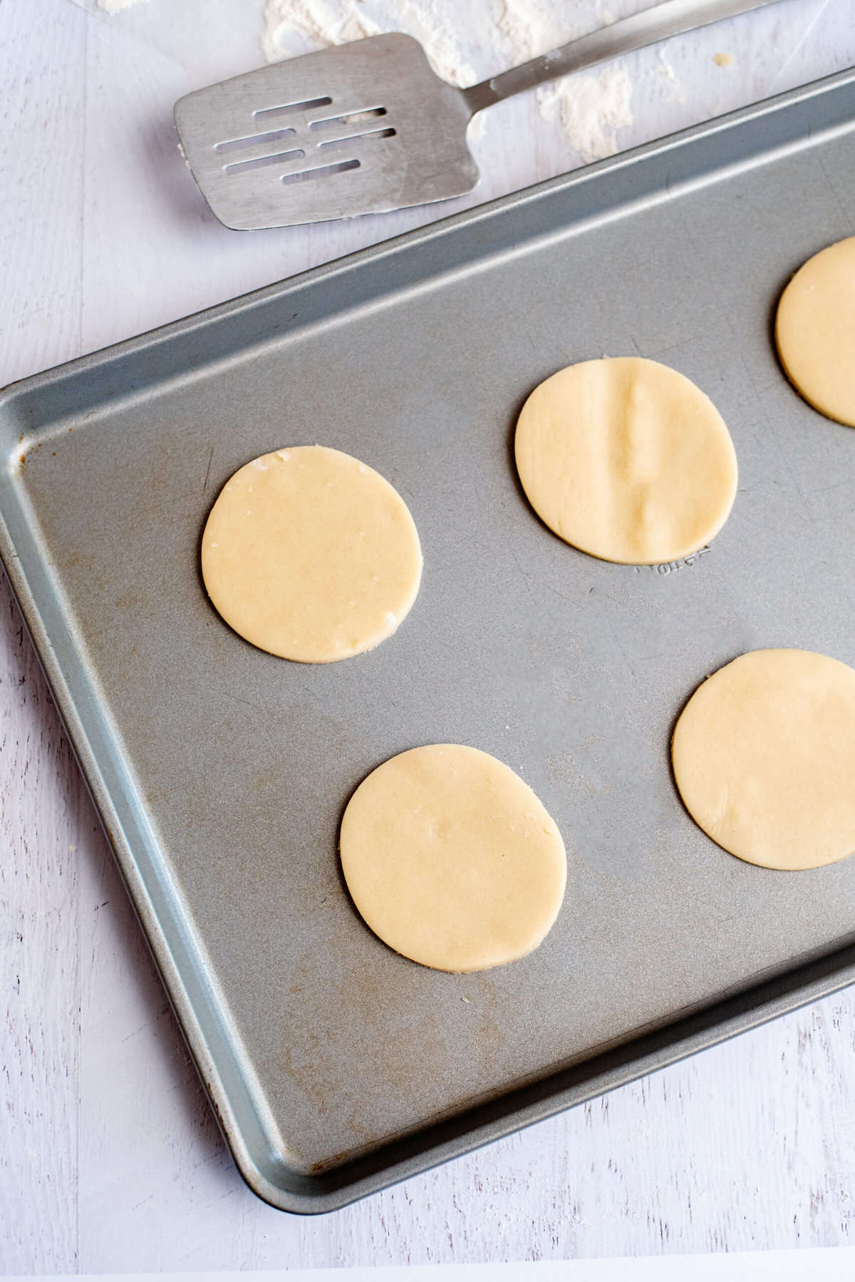 place cookies on the greased cookie sheet