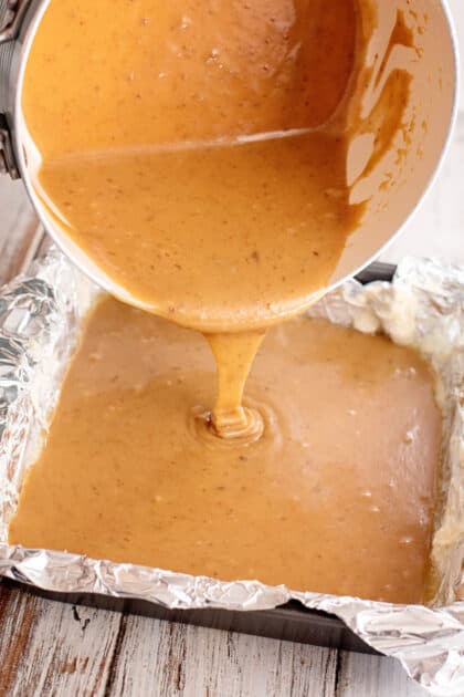 Pour homemade caramel batter into prepared pan.