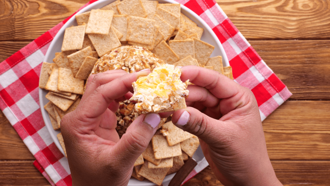 Cracker spread with cheese ball.
