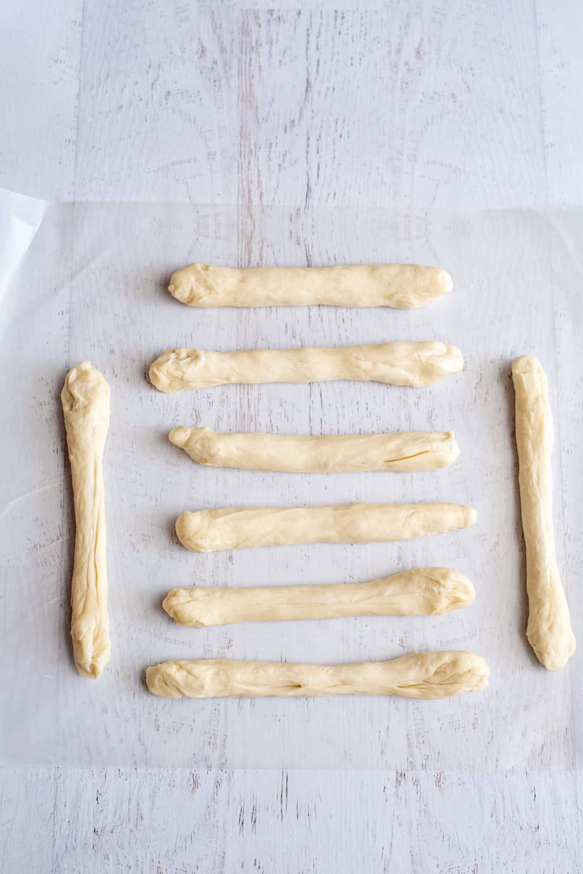 roll dough into 6-inch tubes