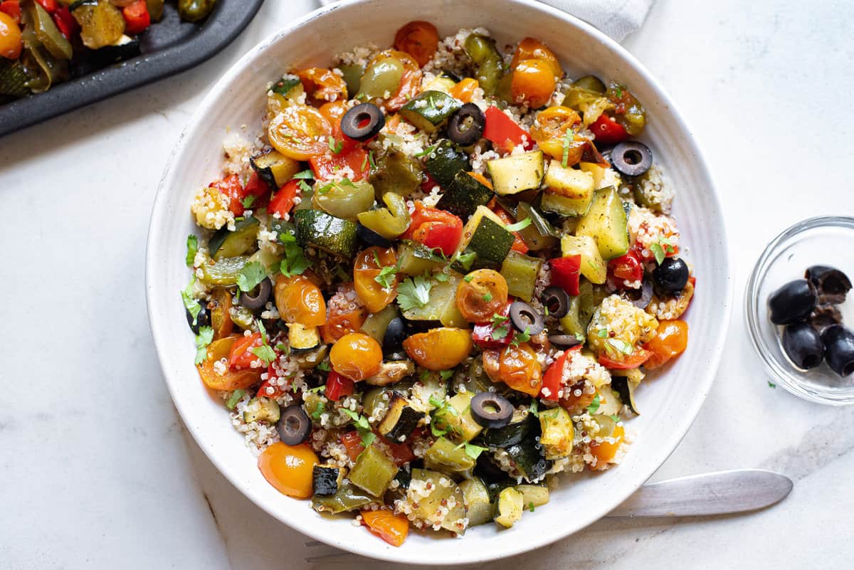 A big bowl of Mediterranean quinoa salad.