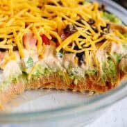 Close up of Tex Mex dip layers in a glass dish.