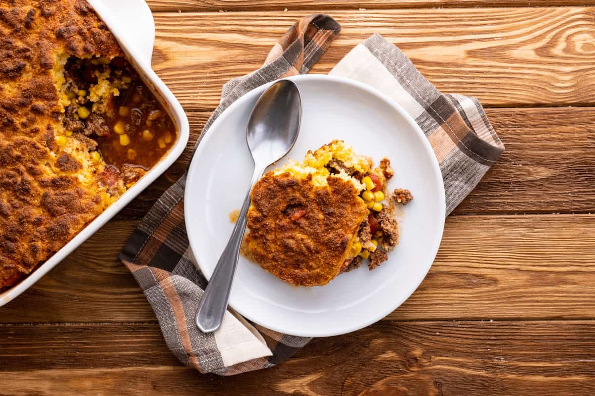 Plate with a serving of Mexican cornbread casserole.