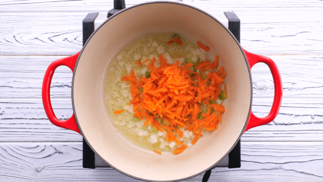 Add onion, celery, and carrot to saucepan.