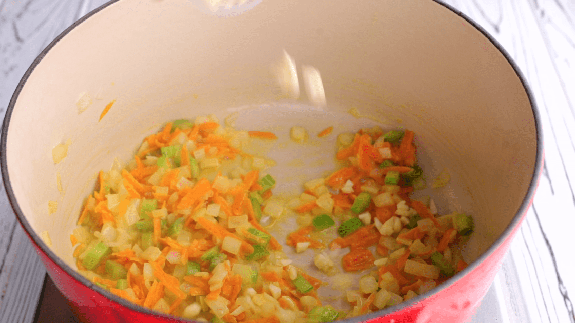 Add garlic to saucepan.
