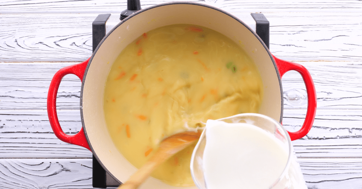 Add milk slowly to saucepan.