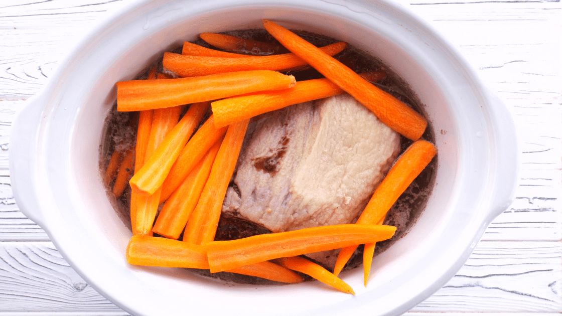 Add carrot to slow cooker.