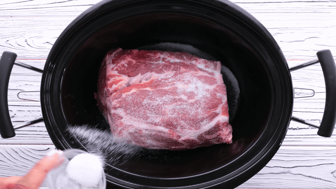 Add salt to slow cooker.