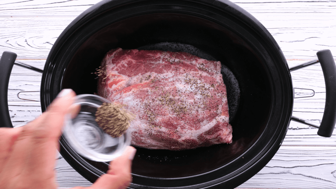 Add pepper to slow cooker.