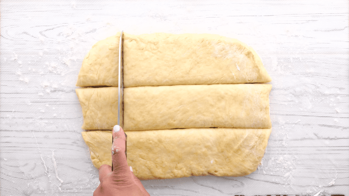 After kneading dough, shape it into a rectangle and cut it into squares.