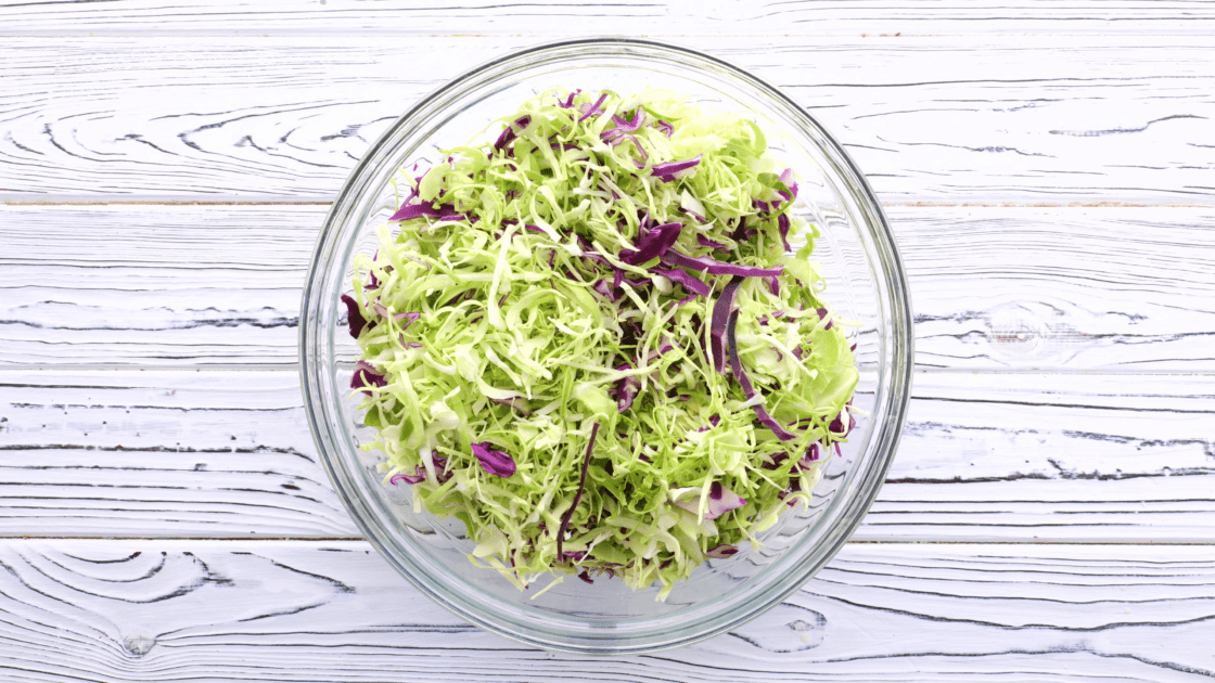 Place cabbage mix in mixing bowl.