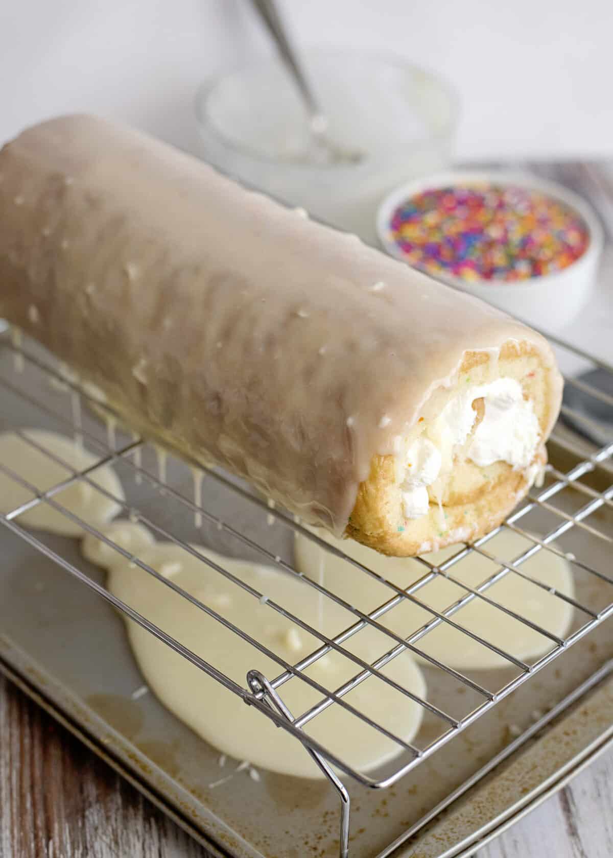 Pour coating over cake roll.