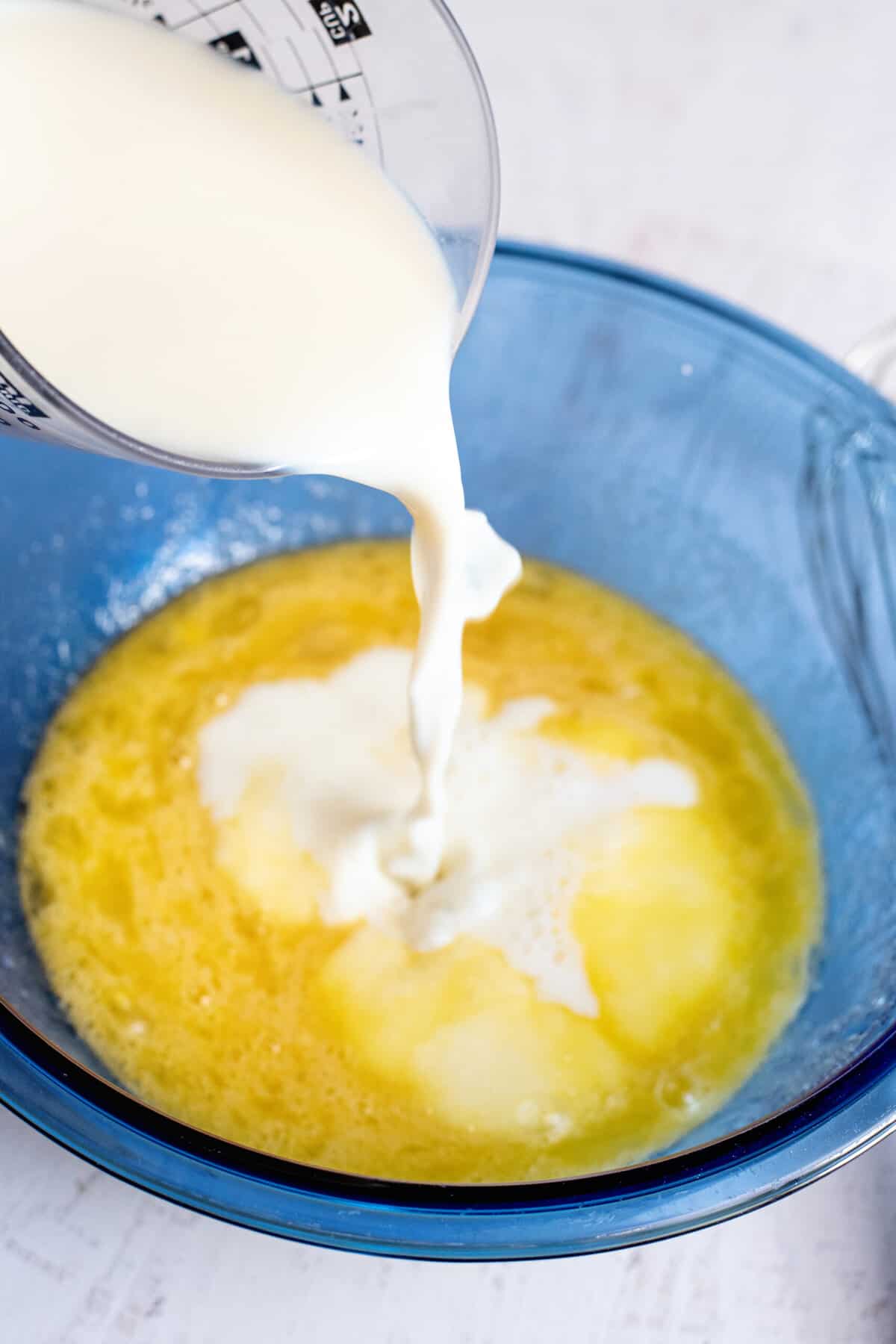 add milk to the eggs and sugar