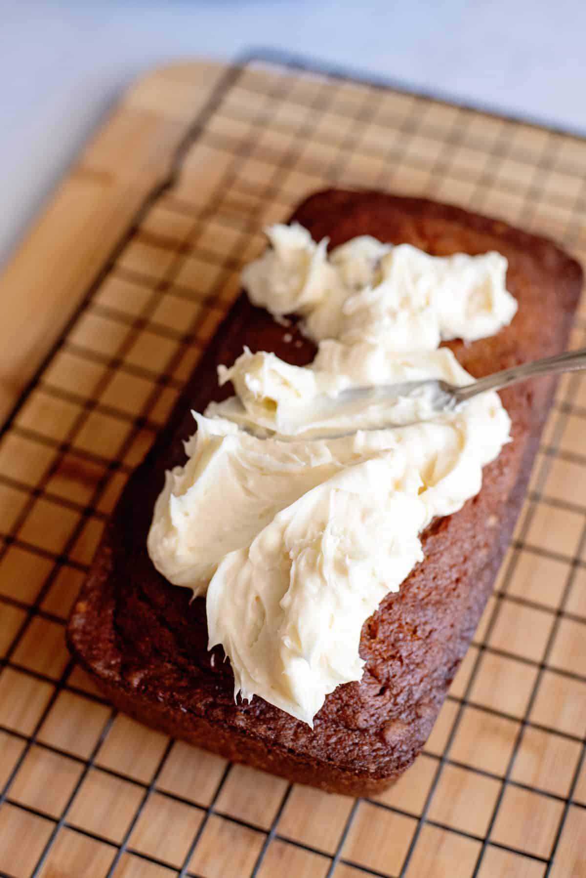 spread frosting over cooled bread