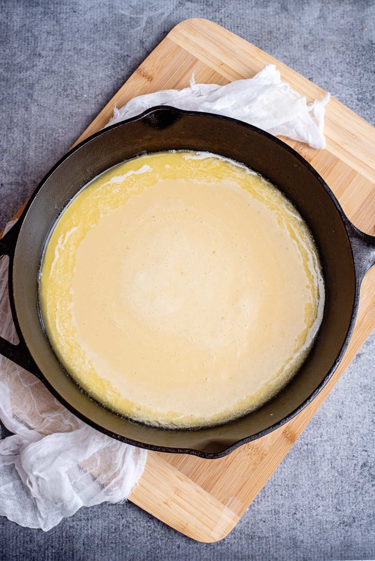 pour the vanilla dutch baby batter into the pan