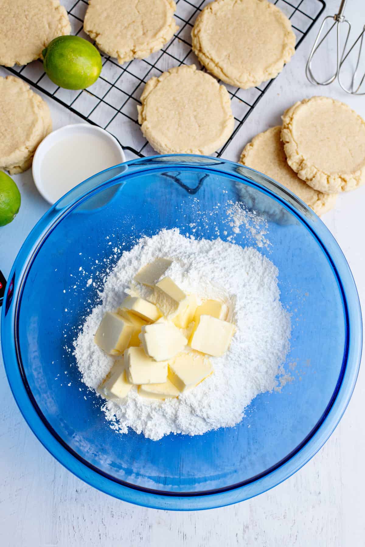 add butter and powdered sugar to a mixing bowl