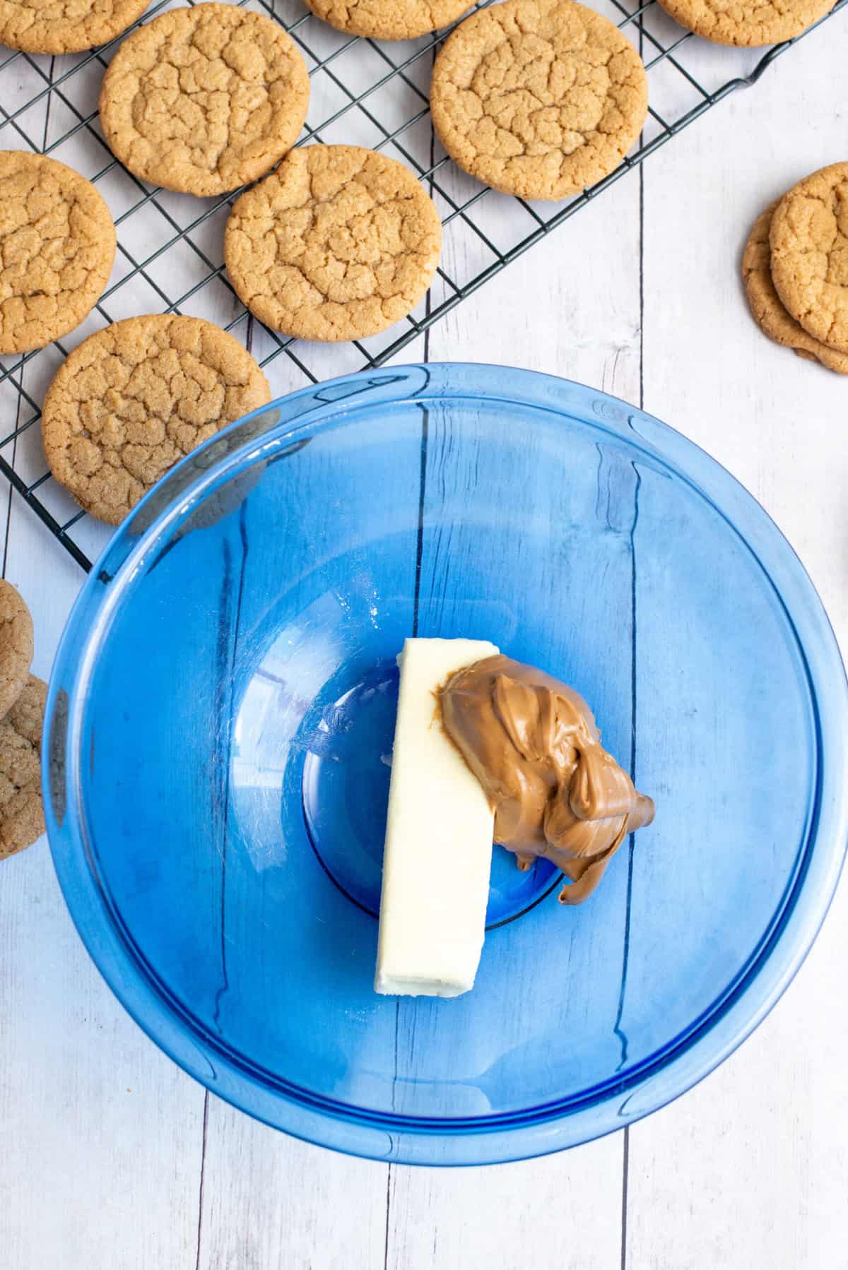 butter and cookie butter in a mixing bowl
