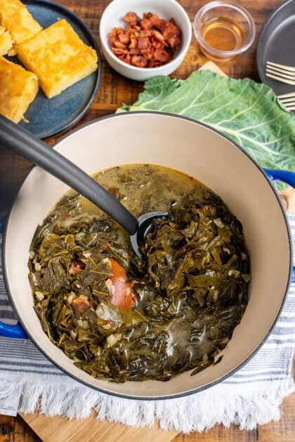 Delicious collard greens in a Dutch oven ready to eat.