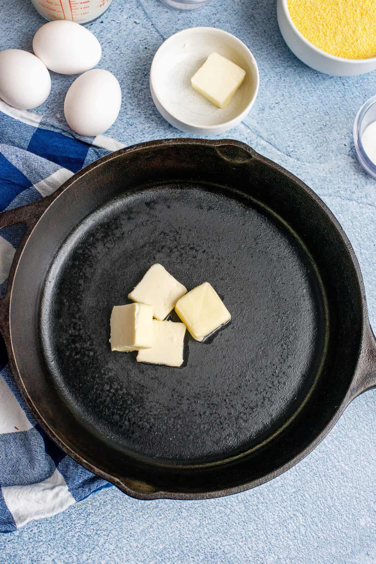 Melting butter in a cast iron pan.